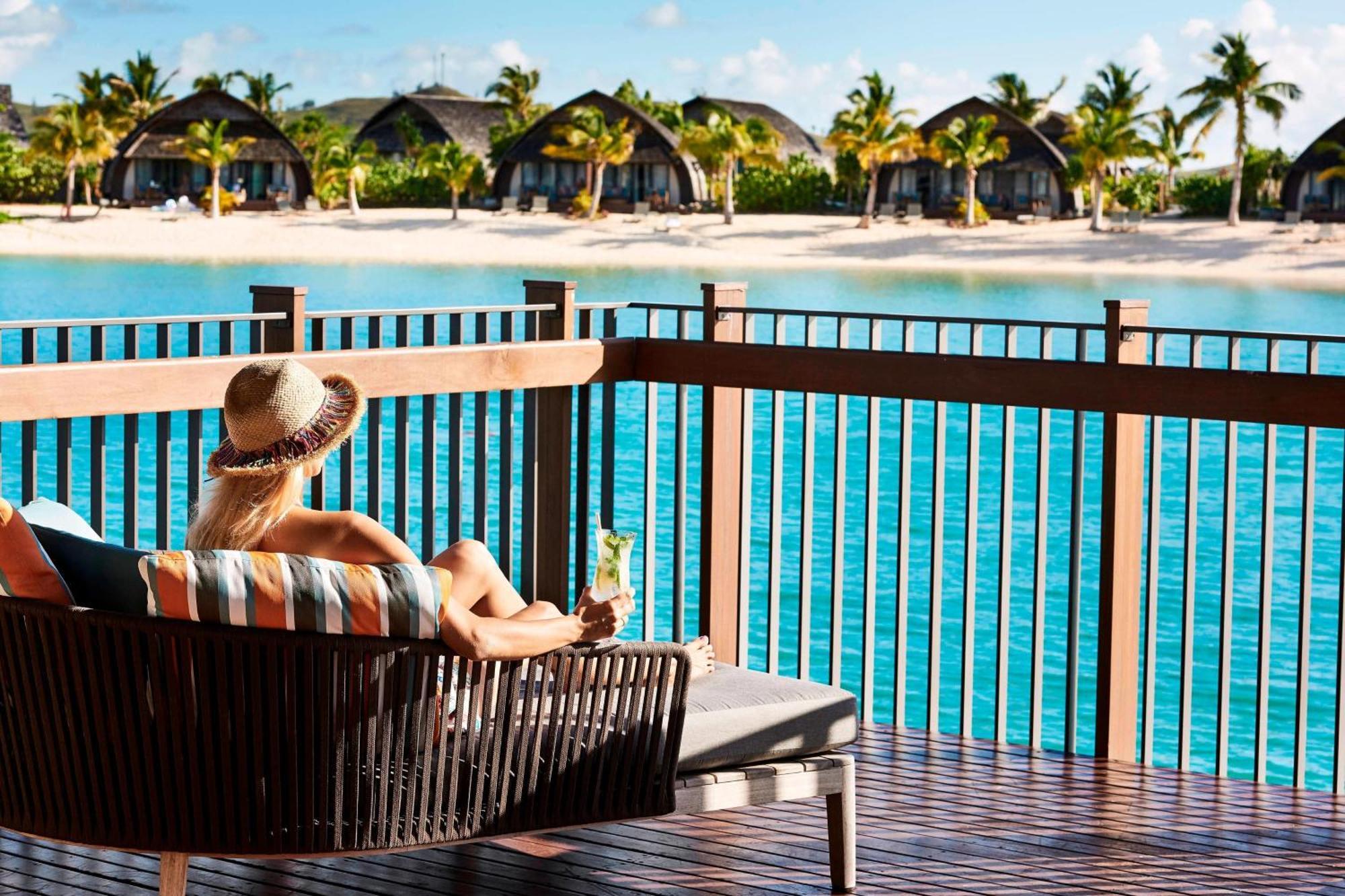 Fiji Marriott Resort Momi Bay Kültér fotó A view of the beach from the resort